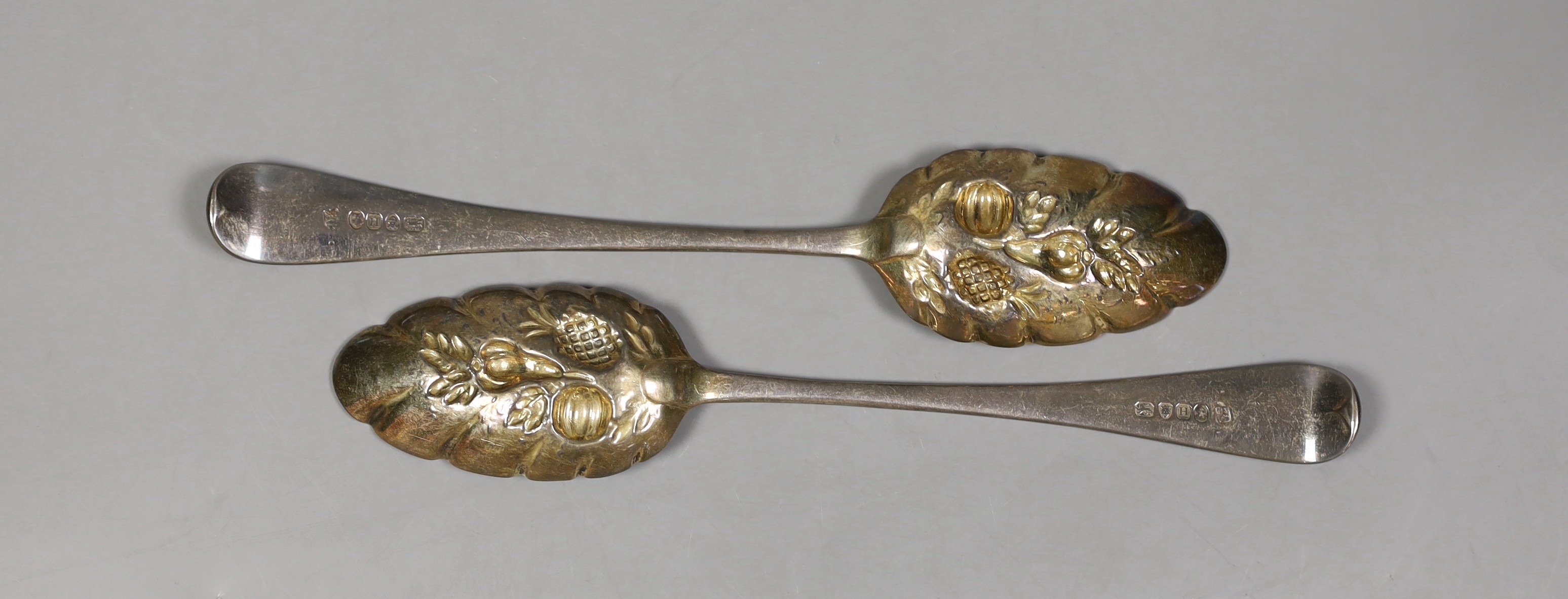 A pair of George III silver Old English pattern 'berry' spoons, Godbehere, Wigan & Bolt, London, 1803, 21.9cm, 132 grams.